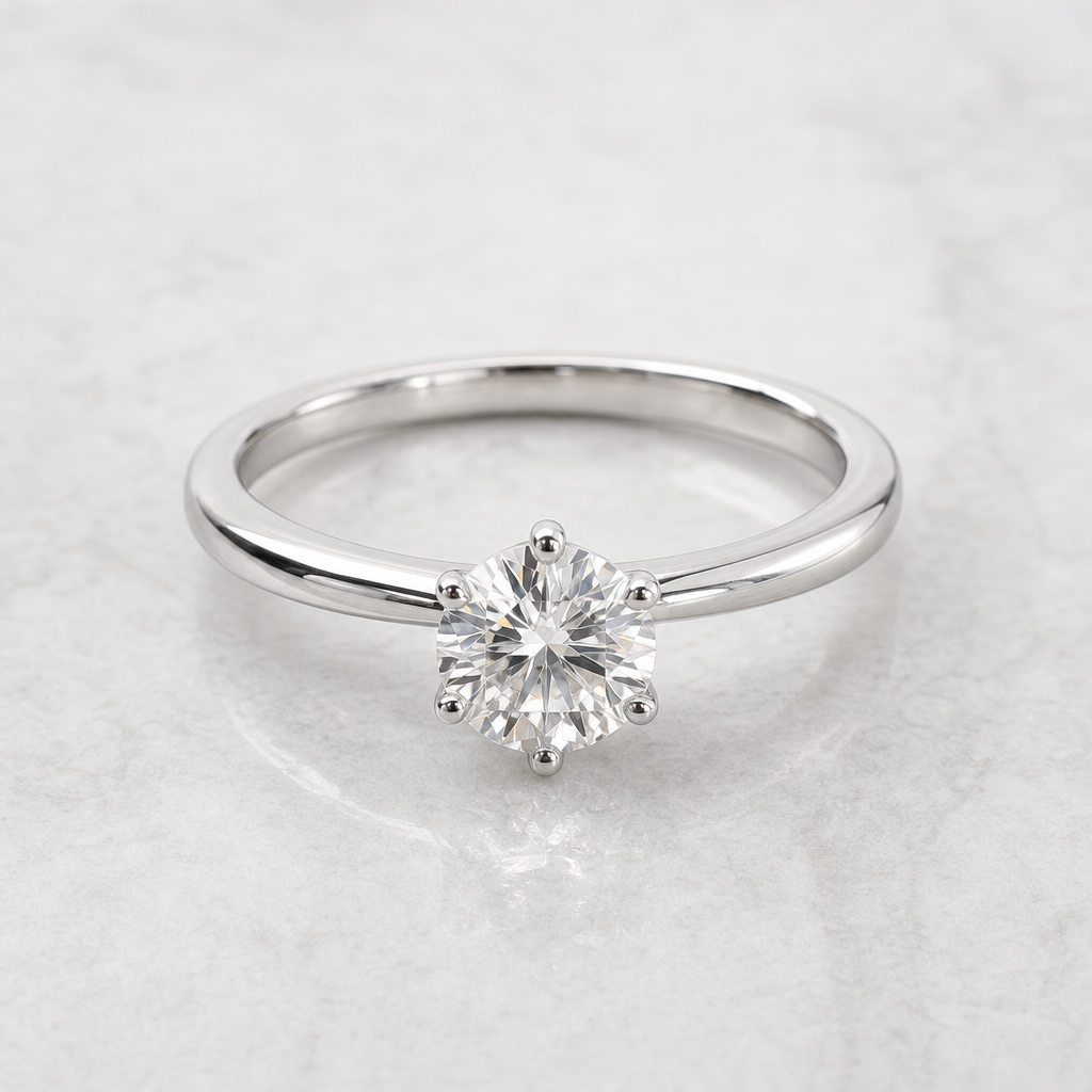 Anello solitario in oro bianco con diamante taglio brillante